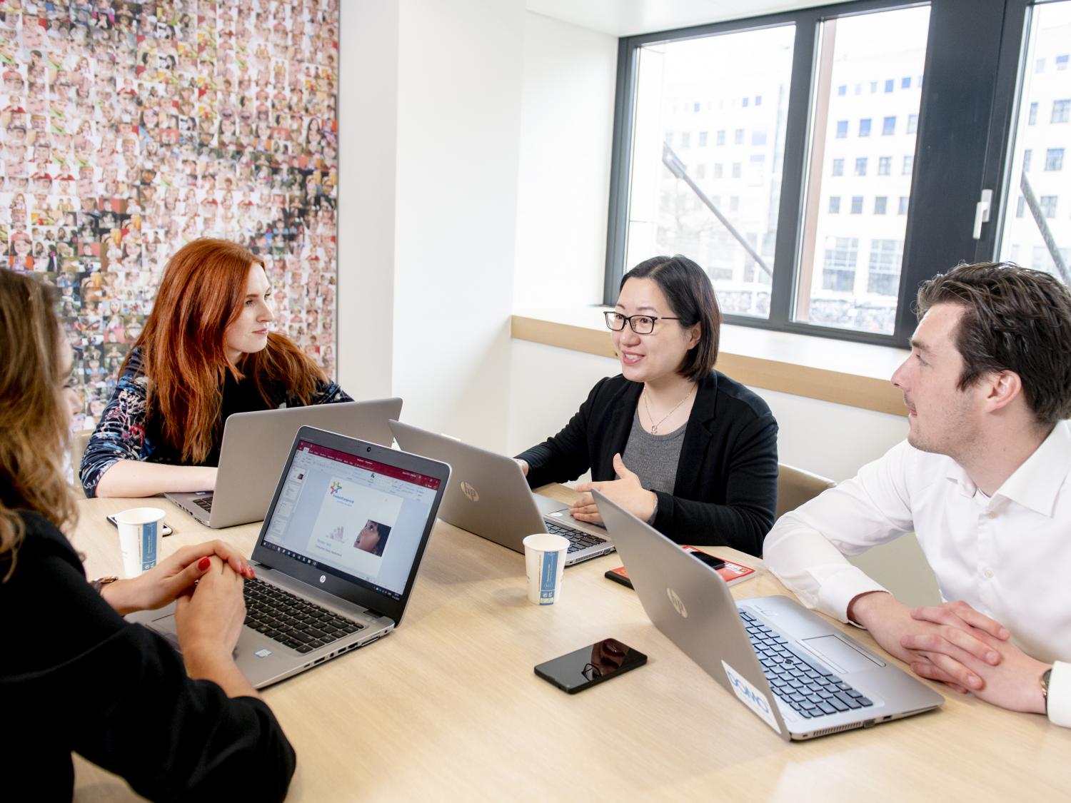 Legal employees in meeting